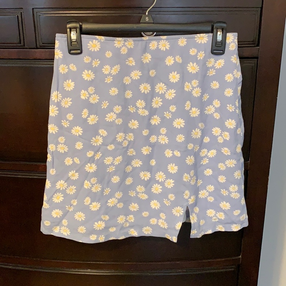 Flower mini skirt.